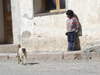 Argentina - Salta province - San Antonio de los Cobres - boy and dog - route of the Tren de las Nubes - Train of the Clouds - images of South America by M.Bergsma