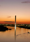 Australia - Melbourne (Victoria): Sunset on the Yarra River - Bolte Bridge - twin Cantilever bridge - architects Denton Corker Marshall - Docklands - photo by Luca Dal Bo