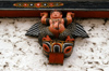 Bhutan - Thimphu - inside Trashi Chhoe Dzong - beautiful wood carving - winged figure - photo by A.Ferrari