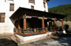 Bhutan - Paro: large prayer wheels, outside Bhutan's national museum - photo by A.Ferrari