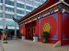 Bandar Seri Begawan, Brunei Darussalam: Tiang Yun Dian Chinese Temple - the red 'Temple of Flying Clouds' - Jalan Sungai Kianggeh with Ceremonial Burner - PGGMB Building faade - photo by M.Torres