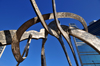 Winnipeg, Manitoba, Canada: 'Justice' - stainless steel sculpture by Gordon Reeve - Remand Centre prison in the background - Kennedy Street corner York avenue - photo by M.Torres