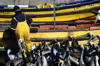 Concon village, Valparaso region, Chile: fisherman feeds pelicans  yellow boats- photo by C.Lovell