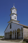 Dalcahue, Chilo island, Los Lagos Region, Chile: neoclassical 19th century church  Plaza de Armas - Chilota church architecture - the tower, always symmetrical, has an entrance-portico and a pediment - culture resulting from Jesuit missionary activities - Patrimonio de la Humanidad - photo by C.Lovell