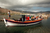 Crete, Greece - Elounda, Lassithi prefecture: back from morning fishing - Cretan fishermen - photo by A.Dnieprowsky