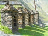 Russia - Dagestan - Tsumada rayon - Selenie Hushet: line of stone piles - Caucasian memorial - cairn (photo by G.Khalilullaev)