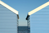 Southwold, Waveney district, Suffolk, East Anglia, East England: beach huts and the Morth Sea - photo by K.White