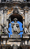 Santiago de Compostela, Galicia / Galiza, Spain: the Cathedral - statue of St. James the Great in the center of the gable, with his two disciples Athanasius and Theodomir, represented as pilgrims - photo by M.Torres