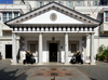 Gibraltar: portico with cannons and coat of arms in the pavement - Guard House of the residence of the Governor of Gibraltar, the Convent - Convent Place, Main Street - photo by M.Torres