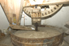 Greece, Karpathos, Olymbos:the grinding gear and corn hopper of the only operating corn windmill in Olymbos - photo by P.Hellander