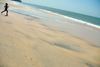 Praia de Varela / Varela beach, Cacheu region, Guinea Bissau / Guin Bissau: boy runing on the beach / Menino a correr na praia - photo by R.V.Lopes