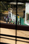 Guinea Bissau / Guin Bissau - Bafat, Bafat Region: young men crossing the old colonial comercial street, everyday life / grupo de jovens a atravessar a antiga rua comercial do perodo colonial portugus, vida quotidiana - photo by R.V.Lopes