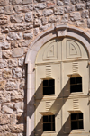 Jerusalem, Israel: Holy Sepulcher church - metal covered window with four small openings - parvis - Christian quarter - photo by M.Torres