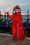 Carnival participant with Carnival costume at Dawn by Canale di San Marco, Venice - photo by A.Beaton