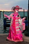 Carnival participant with Carnival costume at Dawn by Canale di San Marco, Venice - photo by A.Beaton