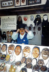 Asia - South Korea - attendant at mask shop - photo by S.Lapides