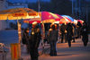 Bishkek, Kyrgyzstan: photographers wait for clients - colourful umbrellas - Ala-Too square - photo by M.Torres