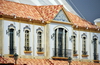 Macau, China: mock Portuguese building with clay roof tiles and ornamental tiles in the faade (azulejos) - Legend Boulevard at Macau Fisherman's Wharf - Doca dos Pescadores - photo by M.Torres