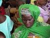 Mopti: woman in Islamic green - at the market (photo by  Alejandro Slobodianik)