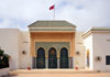 Nouakchott, Mauritania: main entrance of the Moroccan Mosque, with the Moroccan flag and coat of arms - architecture inspired in the Koutoubia in Marrakesh - Mosque Marocaine - photo by M.Torres