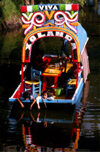 Xochimilco, DF: children relax on a chalupa - canal view - photo by Y.Baby