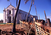 Ilha de Moambique / Mozambique island: boat skeletons and Portuguese church of Santo Antnio - esqueleto de barco junto  igreja de Santo Antnio - photo by F.Rigaud