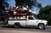 Myanmar - Bago / Pegu: over-crowded pickup - photo by W.Allgwer - ffentlicher Verkehr mit veraltetem Pickup bei Bago. Die Fahrzeuge sind total berfllt, so das die Menschen zum Teil auf dem Dach sitzen. Die Kleinbusse (Pickups) stellen die Nahverkehrsv