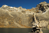 Khumbu region, Solukhumbu district, Sagarmatha zone, Nepal: a cairn in a front of an altitude lake - photo by E.Petitalot