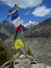 Manang, Gandaki Zone, Nepal: prayer flags on a cairn - Annapurna Circuit - photo by M.Samper