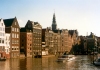 Netherlands / Holland  - Amsterdam: leaning on the canal - view from the Damrak - back of Warmoesstraat - background: Oude Kerk (photo by M.Torres)