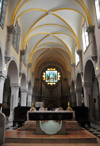 Bethlehem, West Bank, Palestine: St. Catherine's Roman Catholic church - altar, organ and rose window - Gothic nave - ceiling with ribs and bosses - photo by M.Torres