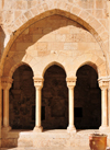 Bethlehem, West Bank, Palestine: St. Catherine's Roman Catholic church - cloister arcade in Gothic revival style - photo by M.Torres