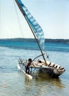 Papua New Guinea - Panaete Island - Louisiade Archipelago: child with outrigger (photo by G.Frysinger)