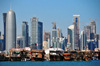 Doha, Qatar: West Bay skyline and sterns of dhows in the dhow harbour - Burj Qatar - dhows and skyscrapers - photo by M.Torres