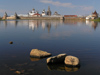 Russia - Solovetsky Islands: the Monastery reflecting in Svyatoe Lake - rocks - photo by J.Kaman