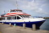 Basseterre, Saint Kitts island, Saint Kitts and Nevis: view of the ferry pier - 'Caribe Surf' leaving for Charlestown in Nevis Island - photo by M.Torres