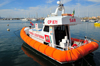 Alghero / L'Alguer, Sassari province, Sardinia / Sardegna / Sardigna: Coast Guard speed boat in the harbour - Guardia Costiera - photo by M.Torres