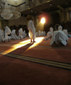 Mecca / Makkah, Saudi Arabia: a hajji prays in Tanaeim mosque - pure white Ihram tunics - photo by A.Faizal