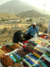 Mecca / Makkah, Saudi Arabia: beads seller at Arafah, during hajj season - the beads are normally used by Muslims after prayers - Hejaz region - photo by A.Faizal