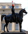 Scotland - Glasgow - a modern art Dukeof Wellington statue outside the Glasgow Gallery of Modern Art - photo by C.McEachern