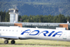 Slovenia - Brnik Airport: fuselage of Adria airplane and Terminal T1 of Ljubljana Joze Pucnik Airport - Adria is Slovenia's flag carrier - photo by I.Middleton