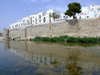 Spain - Peiscola - Houses reflecting in the water - photo by M.Bergsma