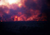 Sudan - White Nile River - Jonglei / Junqali state: fires raging along the River - fires are set  to provide grassing areas for cattle by burning out the papyrus - photo by Craig Hayslip