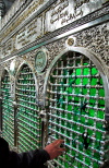 Syria - Damascus: Omayyad Mosque - shrine holding either the head of Zechariah, father of John the Baptist or the head of Hussein, the son of Imam Ali (the son-in-law of Muhammad and the forth of the Rightly Guided Caliphs) - a prayer - photographer: M.Torres