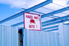 Port of Spain, Trinidad: hard hat sign, fence and steel beams at a construction site - construction safety - photo by E.Petitalot