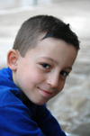 Turkey - Mardin: Kurdish boy at the mosque - photo by C. le Mire