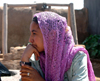 Harran, Sanliurfa province, Turkey: pensive girl - photo by C. le Mire