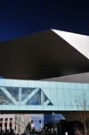 Denver, Colorado, USA: Denver Art Museum - Frederic C. Hamilton building and pedestrian bridge to the Morgan Wing - bold architecture - Public Library in the background - photo by M.Torres