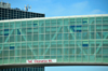 Denver, Colorado, USA: Denver International Airport - pedestrian bridge between the Jeppesen terminal and Concourse A - steel truss structure encased in glass - tail clearance height sign - photo by M.Torres