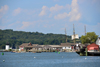 Mystic, CT, USA: Mystic River with its lighthouse and old buildings, Stonington side, the East bank - Mystic Seaport - photo by M.Torres